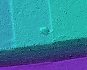 Drone-derived terrain map of a stockpile, with the measured footprint outlined